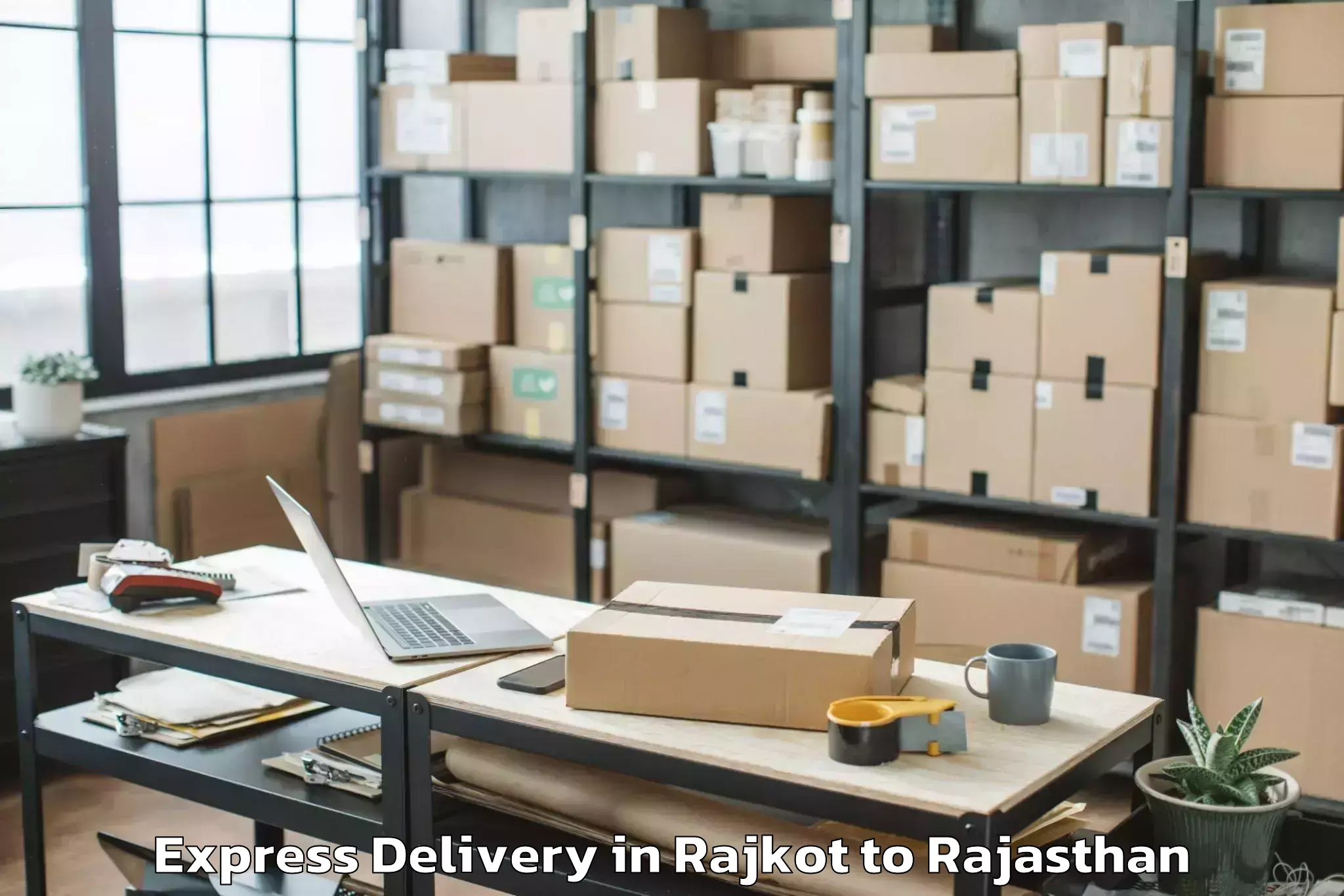 Easy Rajkot to Jagannath University Jaipur Express Delivery Booking